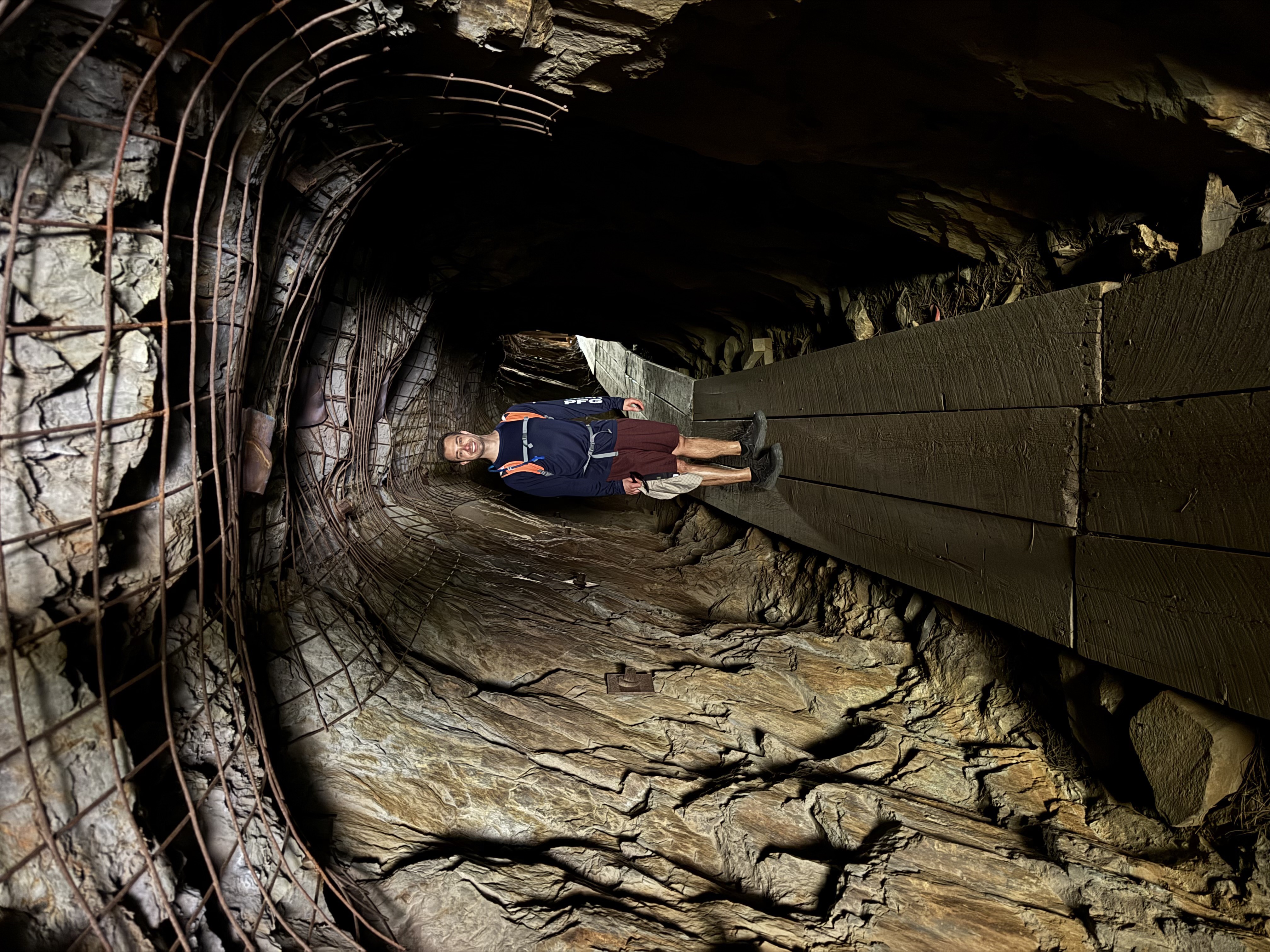 Inside the hand-cut historic flume tunnel on the Flume Trail in the Black Hills